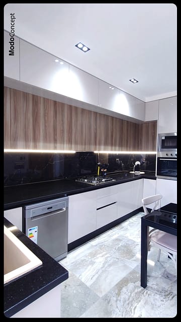 Une cuisine au style net et équilibré 🤍
👉 Bois, noir et blanc s’accordent avec finesse, portés par des lignes simples et une lumière subtile💯

🤝Un équilibre juste entre design et fonctionnalité, signé Modo Concept ©

Contactez-nous
📍 Ariana
📞 +216 23 707 111 | +216 29 664 433
🌐 www.modoconcept.com

#ModoConcept #CuisineSurMesure #DesignIntérieur #CuisineÉlégante #ModernHome #InteriorTunisie